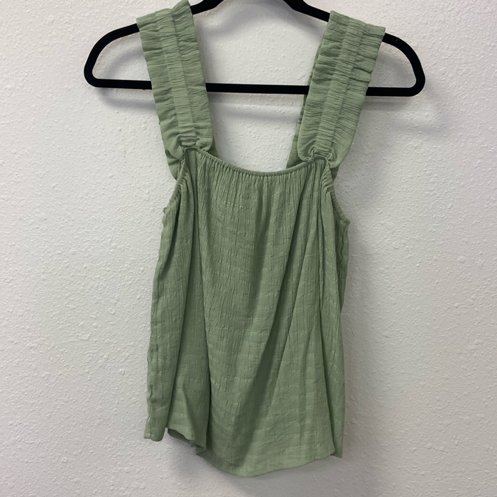 green tank top